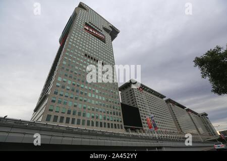 --FILE--The 44-story No 5 building of the Pangu Plaza, a prominent dragon-shaped building, is seen in Beijing, China, 12 October 2014. The auction of Stock Photo