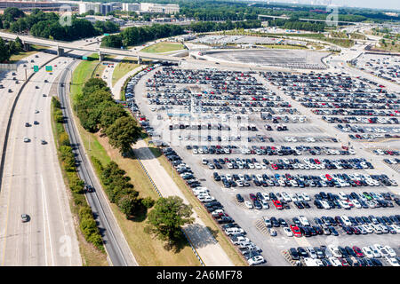 Georgia,Atlanta,Hartsfield-Jackson Atlanta International Airport,aircraft approach aerial view,parking lot,Interstate 85 Highway,GA190819003 Stock Photo