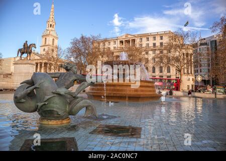 Trafalgar Square fountains with the National Gallery and the bronze statue of King George IV on his horse and St Martin-in-the-Fields church Stock Photo