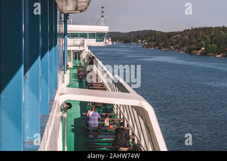 Editorial 06.20.2019 Silja Serenade, moving through the archipelago of Stockholm the crew is washing the deck and windows in the morning Stock Photo