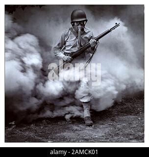 WW2 GAS ATTACK TRAINING 1942 American Soldier at training camp during German trench gas attack exercises Stock Photo