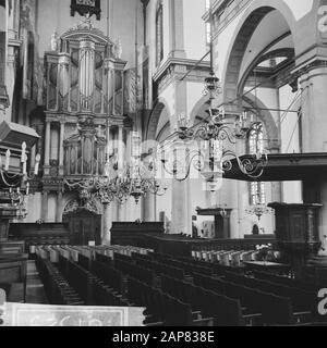 Amsterdam. Interior of the Westerkerk with the large organ and the pulpit Date: 2 September 1965 Location: Amsterdam, Noord-Holland Keywords: Baroque, interior, church buildings, light crowns, organs, pulpit, renaissance, columns Institution name: Westerkerk Stock Photo