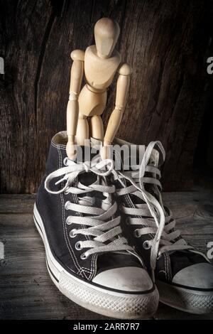 mannequin with gym shoe - still life Stock Photo