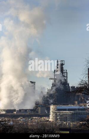 Port Talbot steel works emitting clouds of steam Port Talbot Swansea Glamorgan Wales Stock Photo