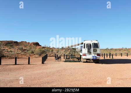 Toyota Coaster Motorhome camping in the Outback at Rainbow Valley, Northern Territory, NT, Australia Stock Photo