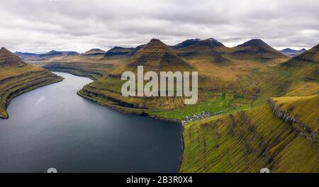 Aerial view of mountains and ocean around village of Funningur on Faroe Islands Stock Photo