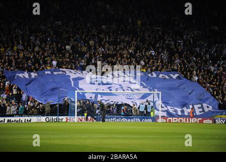 Sheffield Wednesday fans unfurl a giant banner in the stands Stock Photo