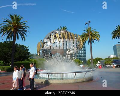 Los Angeles, AUG 21, 2009 - Hollywood, people around the fountain the Universal Studios entrance Stock Photo