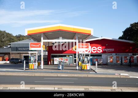 Shell and Coles Express petrol gas station in Avalon Beach Sydney, fuel prices have been declining across australia during covid 19 pandemic,Australia Stock Photo