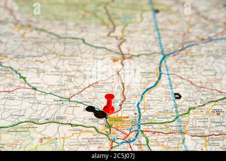 Shallow focus of a red push-pin located at this historic, west country city in England. Stock Photo