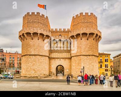 3 March 2020: Valencia, Spain - The Torres de Serranos or Puerta de Serranos, the 14th Century main gate of the walled city of Valencia in southern Sp Stock Photo