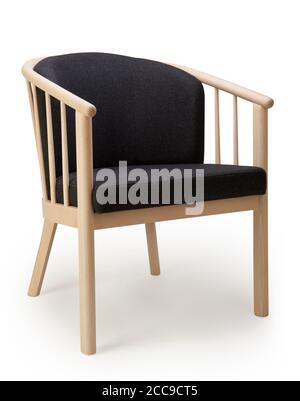 Side view of wooden chair with black textile seat Stock Photo