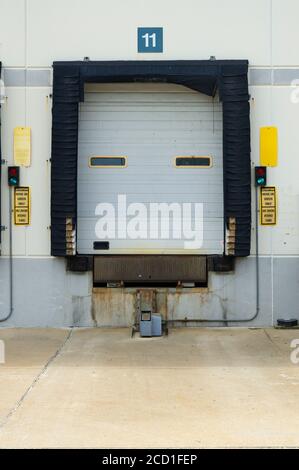 Warehouse loading docks with trucks Stock Photo