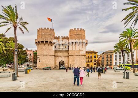 3 March 2020: Valencia, Spain - The Torres de Serranos or Puerta de Serranos, the 14th Century main gate of the walled city of Valencia in southern Sp Stock Photo