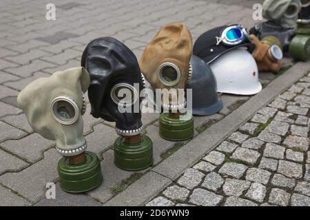 Berlin, Germany April - 18, 2017: Gas masks of second world war displayed on street for tourists as souvenir Stock Photo