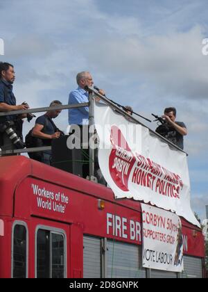 Jeremy Corbyn at a rally in Milton Keynes in August 2016.  He appeared on top of a fire engine at Station Square. Stock Photo