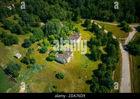 Belarus. Aerial View Of Abandoned Houses In Chernobyl Zone. Chornobyl Catastrophe Disasters. Dilapidated House In Belarusian Village. Whole Villages Stock Photo