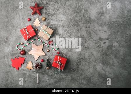 Christmas concept background.Christmas decoration in form of a christmas tree in gray background Stock Photo