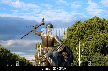 Statue in london near buckingham palace trees blue sky clouds Stock Photo