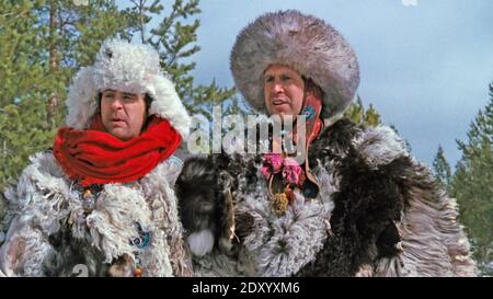 SPIES LIKE US 1985 Warner Bros. Pictures film with Dan Aykroyd at left and Chevy Chase Stock Photo