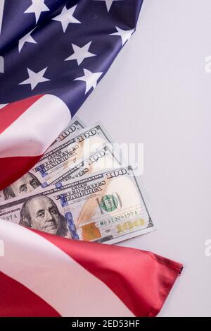 Collage of Dollar bills elements and American flag. Stock Photo