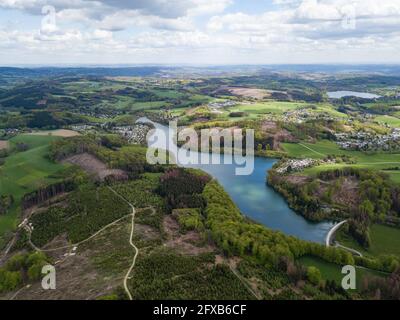 Aerial view of the Lingesetalsperre (Lingese dam) in Marienheide in Germany and the Bruchertalsperre (Brucher dam)  in the background Stock Photo