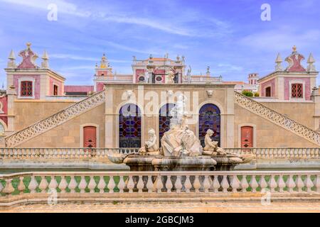 The pink Estoi palace, Palacio De Estoi a fine example of rococo architectue now part of a hotel. Estoi Algarve Portugal Stock Photo