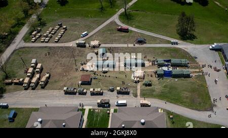 210430-N-PC620-0272  BUTLERVILLE, Ind. (April 30, 2021) An aerial view of a mass decontamination line at Muscatatuck Urban Training Center, Indiana, where exercise Guardian Response 21 (GR 21) participants conduct simulated chemical, biological, radiological or nuclear disaster response operations, April 30, 2021. GR 21 is an annual exercise used to train and evaluate the Department of Defense's chemical, biological, radiological and nuclear (CBRN) response enterprise (CRE). Upon completion of the culminating training event, the CRE allocated units are postured to rapidly deploy to support no- Stock Photo