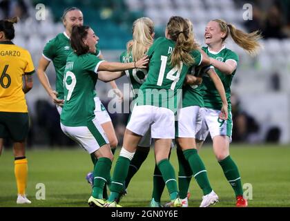 Republic of Ireland's Denise O'Sullivan (hidden) celebrates scoring their side's second goal of the game with team-mates during the women's international friendly match at the Tallaght Stadium in Dublin, Ireland. Picture date: Tuesday September 21, 2021. Stock Photo