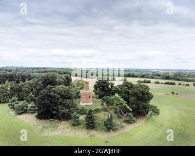 landscape image from above of The Bourbon Tower near stowe gardens set in the countryside of Buckingham in england. Was built as a house for the estat Stock Photo