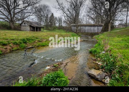 Old Covered Bridge and Log Cabin - North-central Kentucky Stock Photo