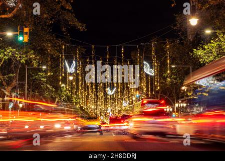 Spain. 26th Nov, 2021. Christmas lights and traffic are seen at night in the city downtown in the Passeig de Gracia main street in Barcelona, Spain on November 26, 2021. (Photo by Davide Bonaldo/Sipa USA) Credit: Sipa USA/Alamy Live News Stock Photo