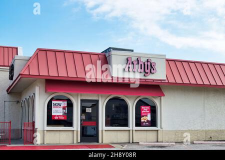 Houston, Texas USA 11-12-2021: Arby's fast food storefront in Houston TX. American sandwich restaurant chain founded in 1964. Stock Photo