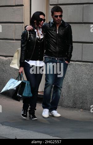 Footballer Adrian Mutu and his wife Consuelo spotted shopping in Milan, Italy. Stock Photo