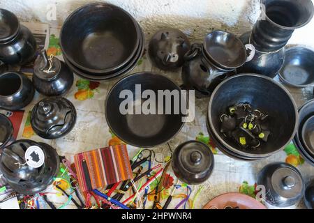 A collection of black pottery and other items available at a indigenous potters collective near Jinotega, Nicaragua, photographed from above. Stock Photo