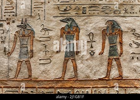 Anubis, Sobek and Horus at the tomb of Osiris in the 5th hour of the night from the Amduat, in the tomb of Ramesses III, KV11, Valley of the Kings Stock Photo