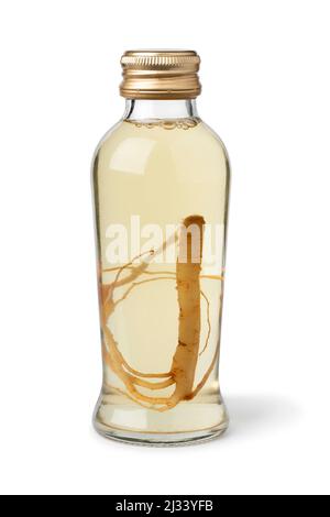 Single glass bottle with Ginseng drink and ginseng root isolated on white background close up Stock Photo