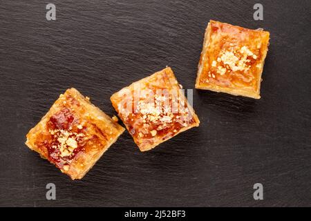 Sweet baklava classic on slate stone, macro, top view. Stock Photo