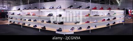 nike chicago store display rack panoramic view of shoe cabinet high end sneakers nike outlet store jordans Stock Photo