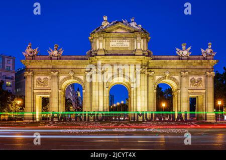 Alcala gate with traffic lights at the blue hour. Photo taken on 31st of May 2022 in Madrid, Spain. Stock Photo