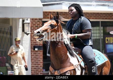 African American cowboys parade on horseback through Zebulon, NC, as part of a weekend long Juneteenth celebration of emancipation from slavery. Stock Photo