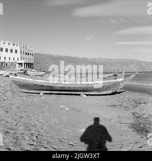 41. Spain. Photo journal is available at B.M.A. + Photo albums. Acquisition: Books and archive materials. Photos taken 1959-11-12.12 Pictures in series. According to notes: Spain. S. Mediterranean coast, Castell de Ferro, 12/11-59. Old -fashioned boat on the beach. A several boats are commissioned on a beach. Above the beach is a residential building. Stock Photo