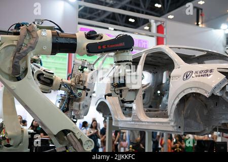 A Robot arm display working on a car in the Smart China Expo in Chongqing, China Stock Photo