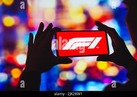 In this photo illustration, the Formula One logo is displayed on a smartphone screen. Stock Photo