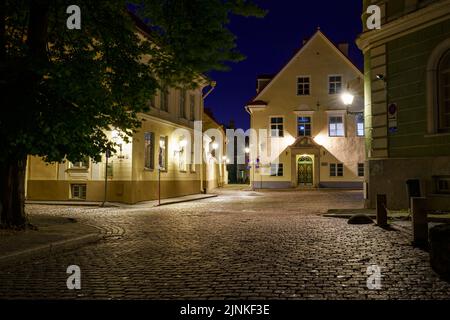 Cobbled streets of Tallinn Estonia at dusk after raining. Stock Photo