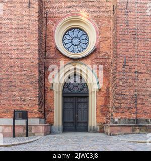 Entrance of Riddarholmen Church, located in the island of Riddarholmshamnen, old city, Gamla stan. before sunset in a summer day, Stockholm, Sweden Stock Photo