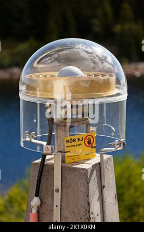 Ratan, Norrland Sweden - July 29, 2022: measuring instrument for various weather phenomena and precipitation - the text on the sign says do not touch Stock Photo