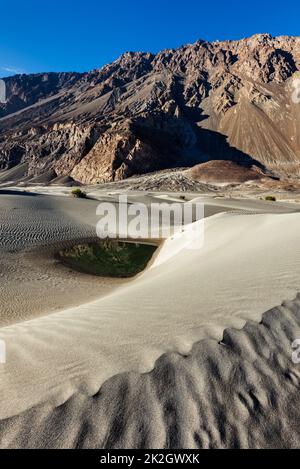 Sand dunes in mountains Stock Photo