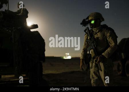 A United Arab Emirates soldier prepares for a night exercise with U.S. Marines from Headquarters Company, 3rd Light Armored Reconnaissance Battalion, 1st Marine Division, at Marine Corps Air Ground Combat Center Twentynine Palms, California, Oct. 3, 2022. The training focused on developing the intelligence, surveillance, target acquisition, and reconnaissance capabilities of the UAE service members. (U.S. Marine Corps photo by Lance Cpl. Earik Barton) Stock Photo