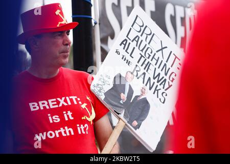 Anti-Brexit activist Steve Bray, wearing a hat and t-shirt featuring a hammer and sickle, demonstrates outside the Houses of Parliament in London, England, on July 22, 2020. Yesterday saw the publication of the long-awaited Intelligence and Security Committee (ISC) report on Russian activity in the UK, which includes among its assertions the claim that the British government 'actively avoided' investigating possible Russian interference in the 2016 referendum on EU membership. (Photo by David Cliff/NurPhoto) Stock Photo